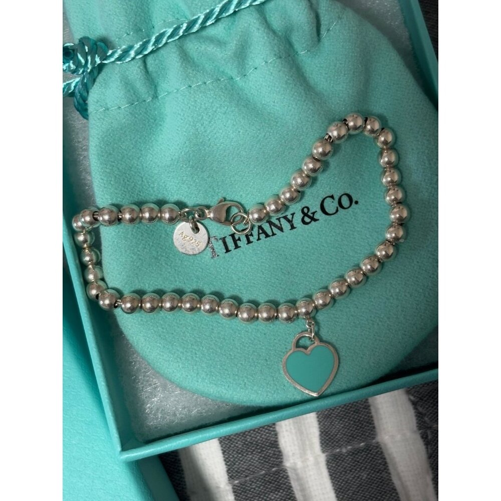 Tiffany & Co. Silver Beaded Bracelet with Blue Heart Charm